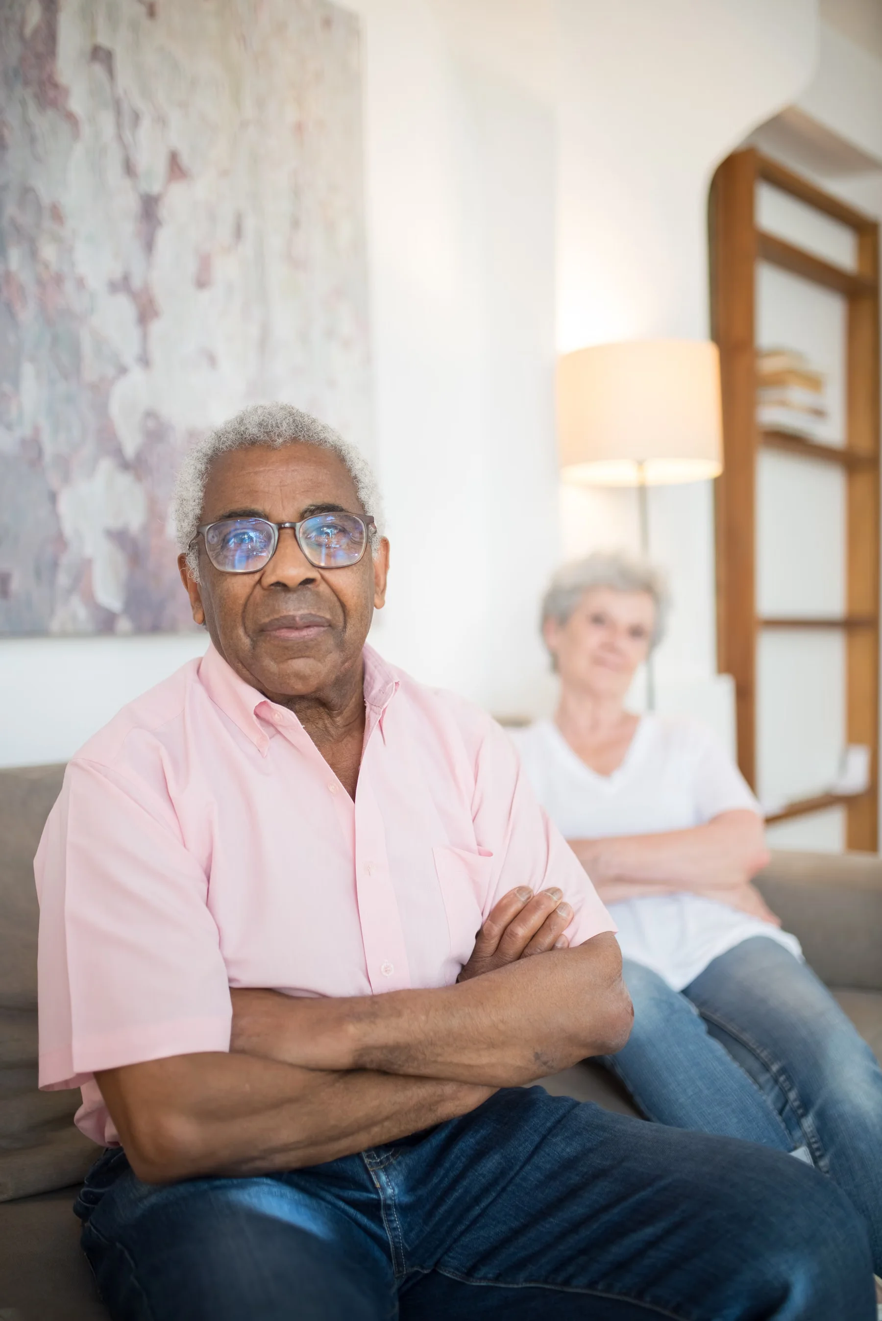An older man and woman spending time together at home.